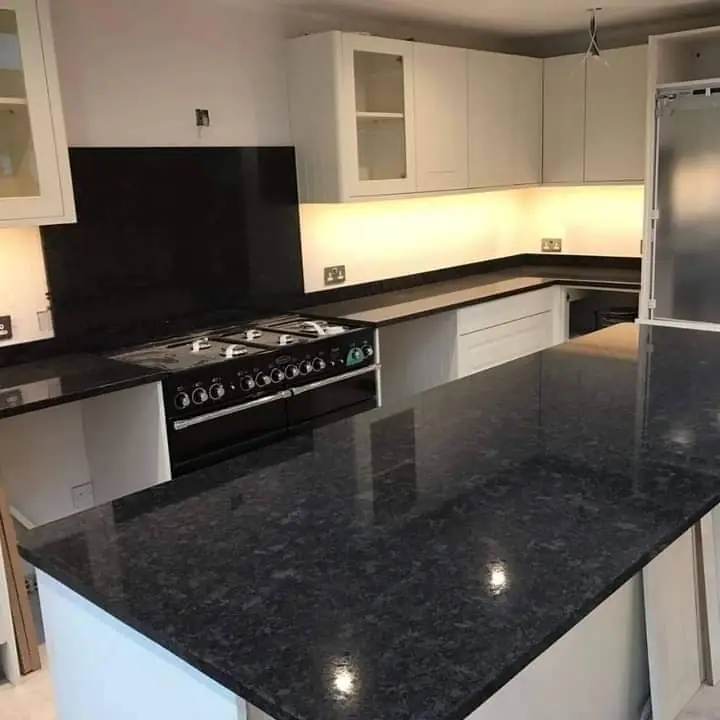 Dark kitchen island and worktops