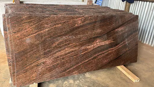 Deep brown veined slab with a polished face