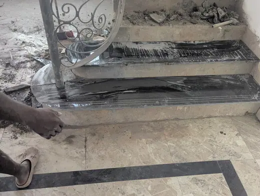 Entrance steps and landing with dark stone edging