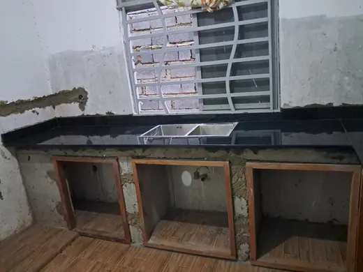 Sink and counter installation in an unfinished kitchen