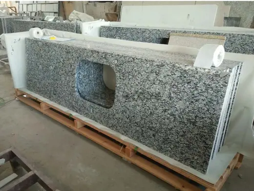 Speckled top with a shaped opening in a workshop
